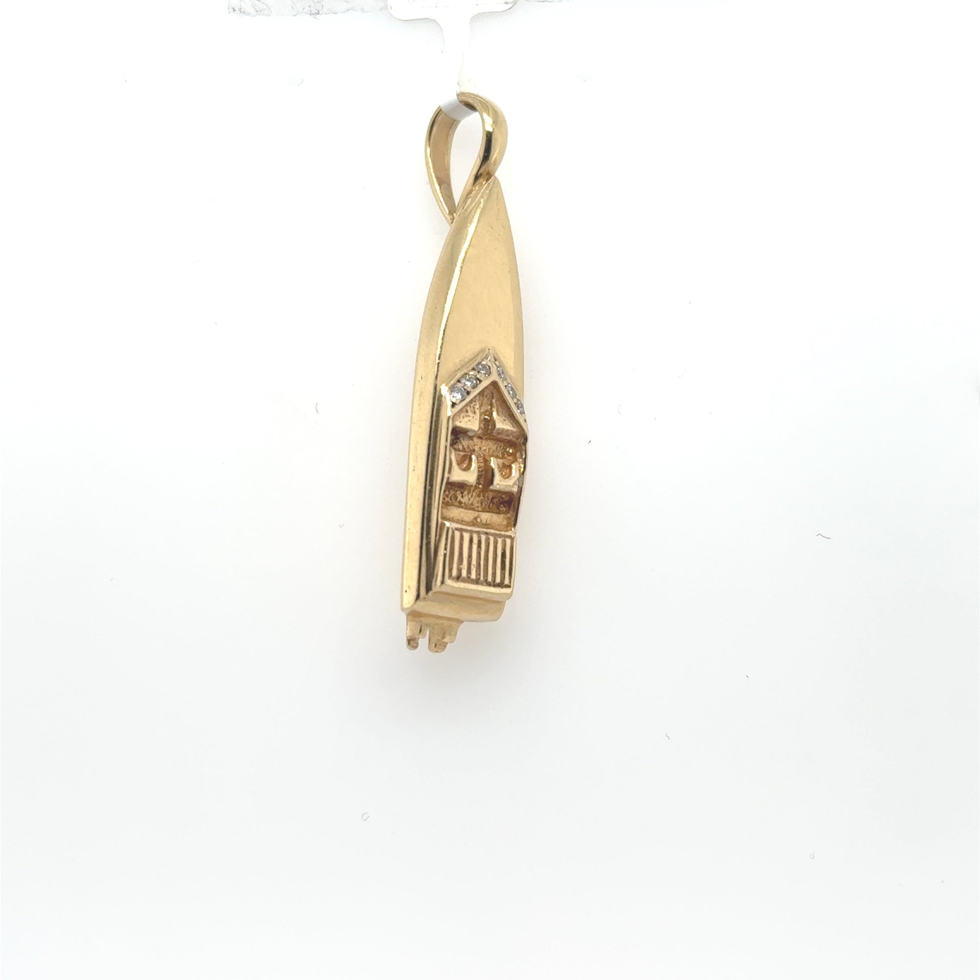 14K yellow gold speedboat pendant with diamond accents and a fixed bail.