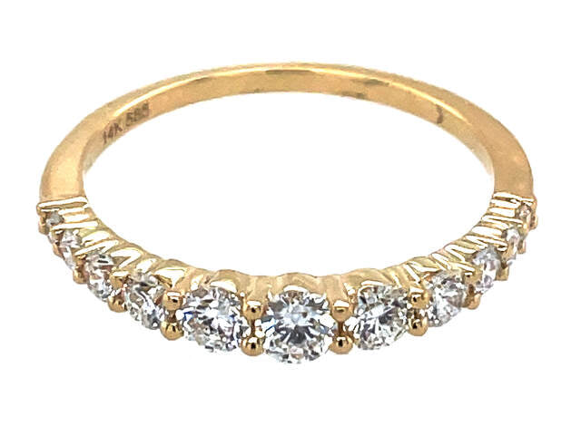 14K yellow gold band with graduated round diamonds in shared-prong setting.