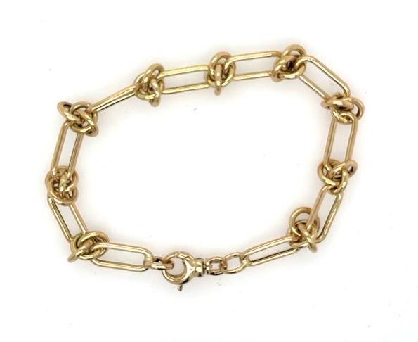 14K yellow gold love-knot link bracelet with elongated oval links and lobster clasp.