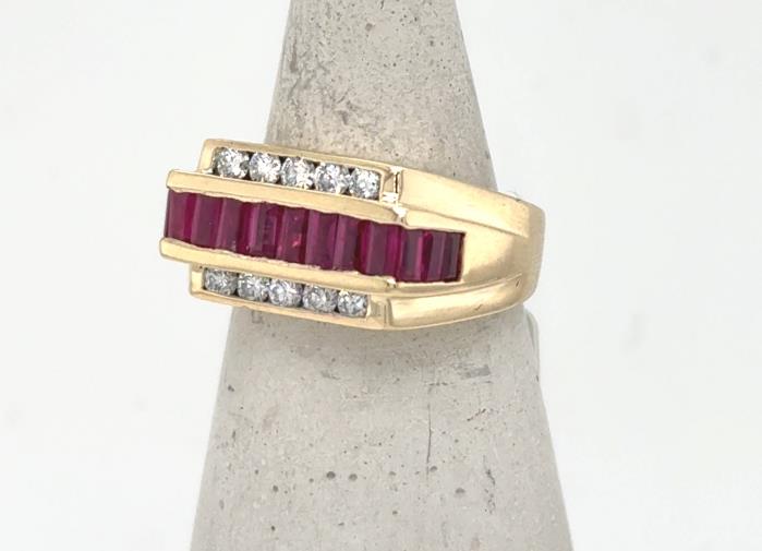 14K yellow gold men’s ring with channel-set baguette rubies and round diamonds.