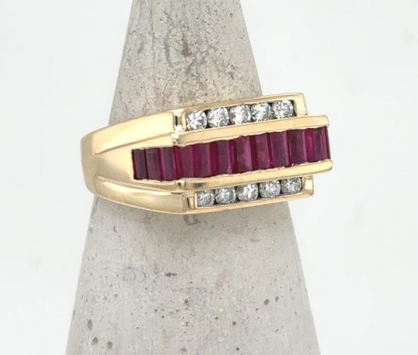 14K yellow gold men’s ring with channel-set baguette rubies and round diamonds.