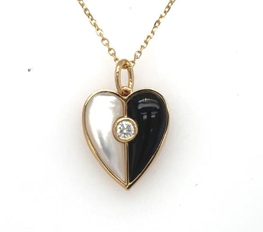 14K yellow gold heart pendant with half mother-of-pearl, half onyx, central bezel-set diamond on cable chain.