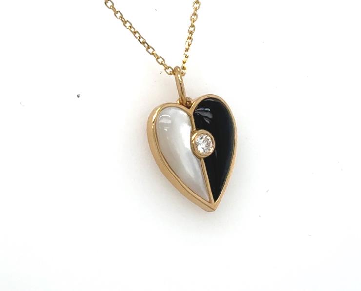 14K yellow gold heart pendant with mother‑of‑pearl, onyx, and bezel‑set diamond.