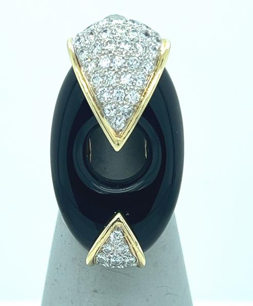 14K yellow gold ring with oval black onyx and pavé diamond chevron accents.