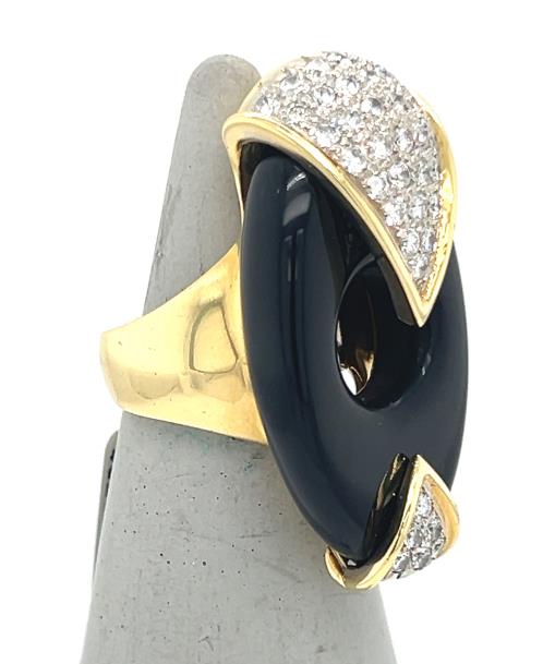 14K yellow gold ring with oval black onyx and pavé diamond accents.