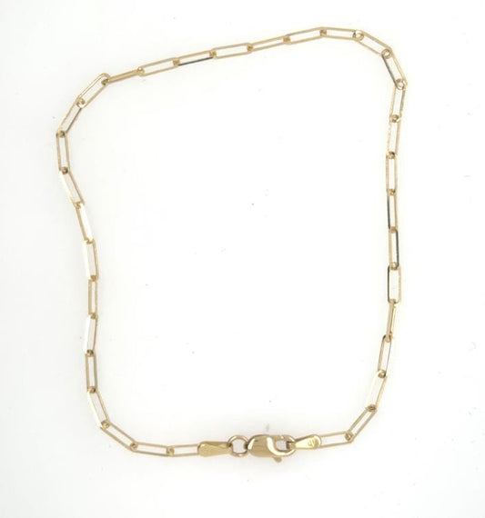 14K yellow gold paperclip link bracelet with elongated links and lobster clasp.