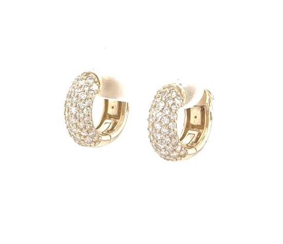 Small 14K yellow gold huggie earrings with four-row pavé diamond fronts.