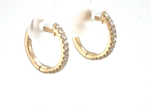 14K yellow gold petite huggie hoop earrings with pavé-set round diamonds.
