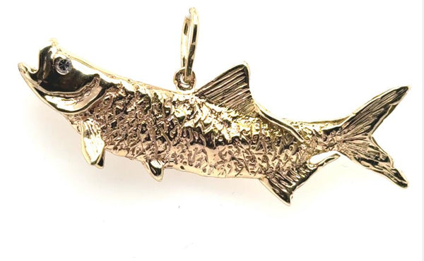 14K yellow gold tarpon pendant with textured scales and a small diamond eye.