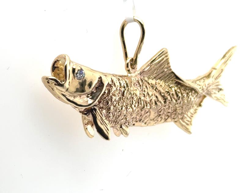 14K yellow gold tarpon pendant with detailed scales and a diamond eye.