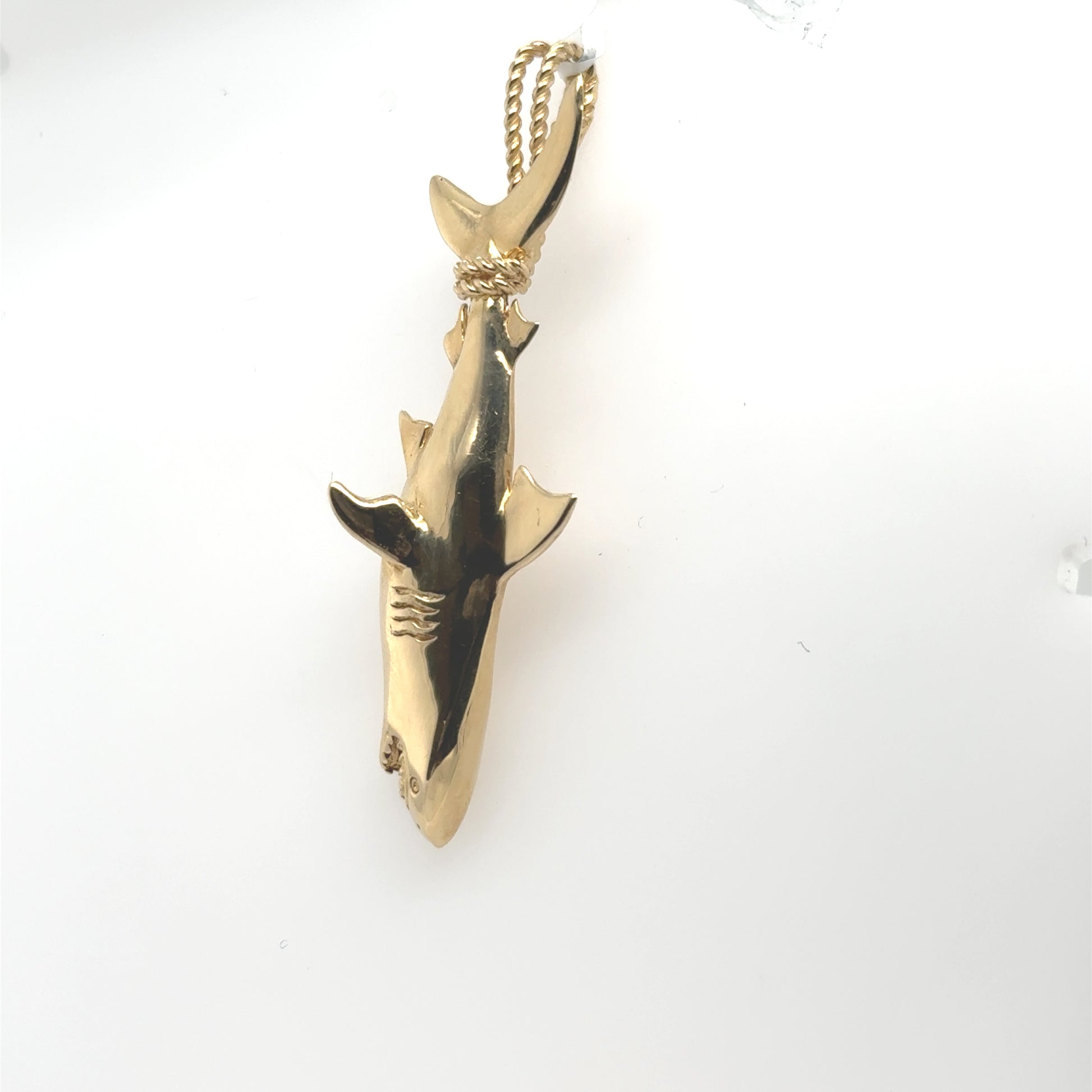 14K yellow gold three-dimensional shark pendant with cable bail and polished finish.