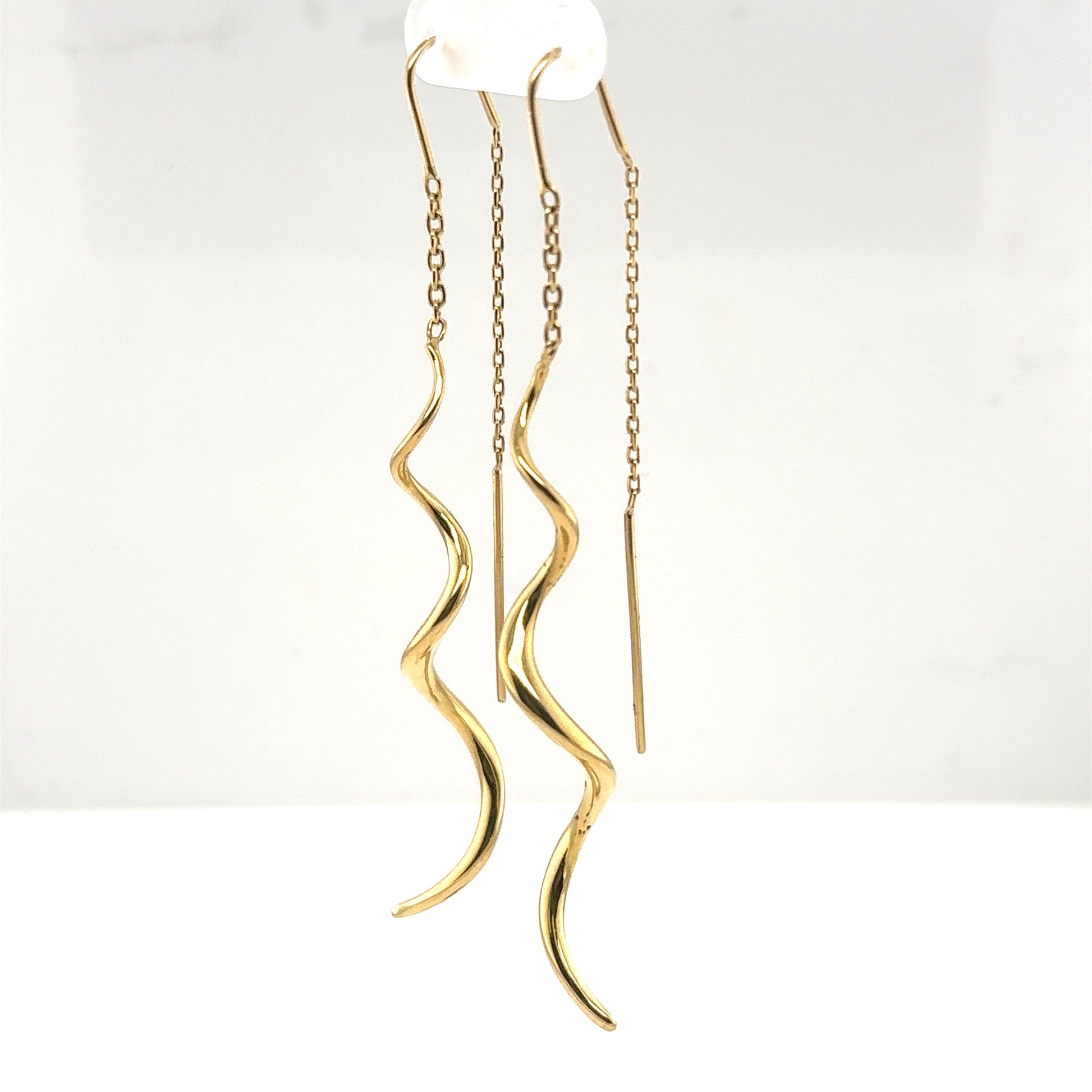 14K yellow gold threader earrings with twisted drop tubing and delicate chains.