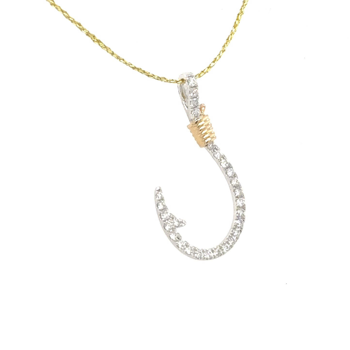 14K white gold diamond hook pendant with yellow gold wrapped accent near bail.