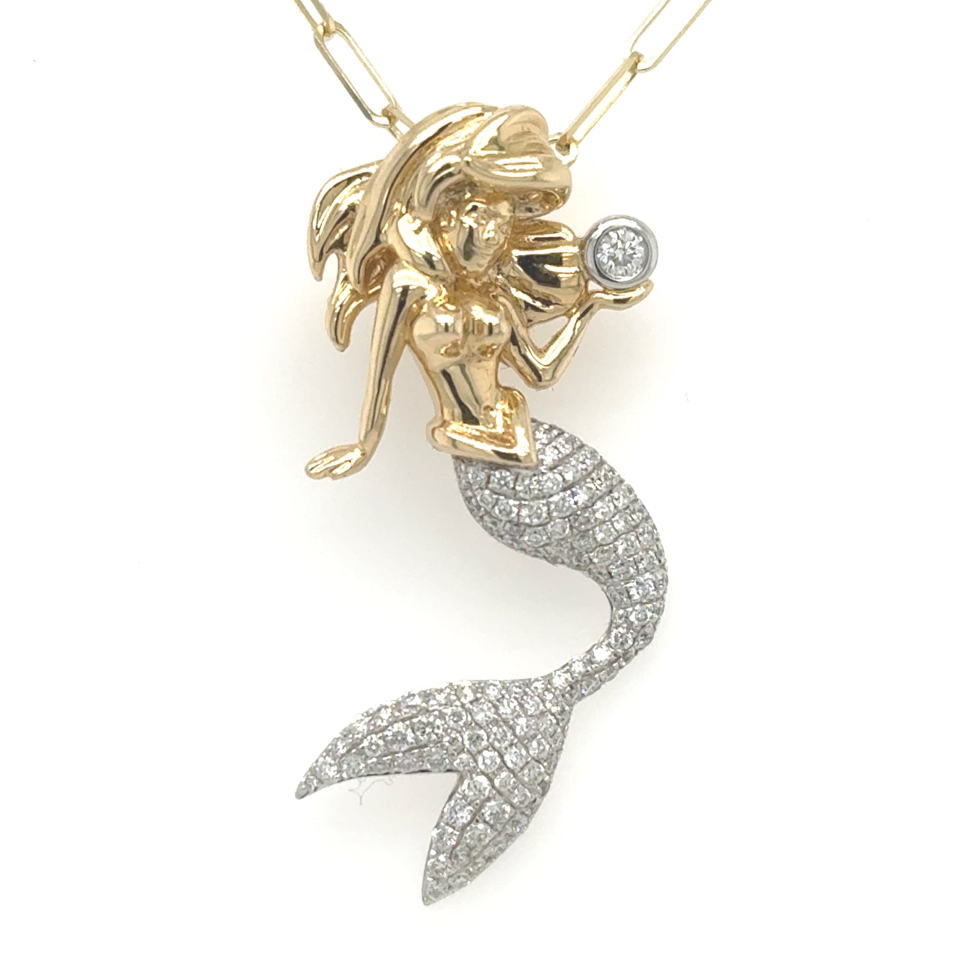 14K yellow gold mermaid pendant with pavé diamond white-gold tail and bezel-set diamond.