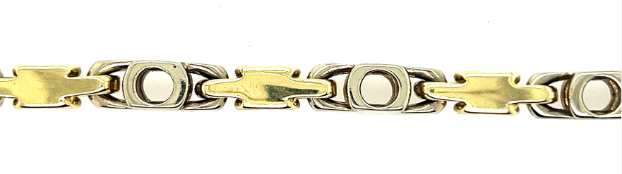 Men’s bracelet with alternating yellow and white gold fancy links, rectangular and oval.