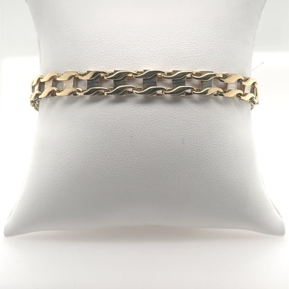 14K yellow and white gold railroad link bracelet with lobster claw clasp.