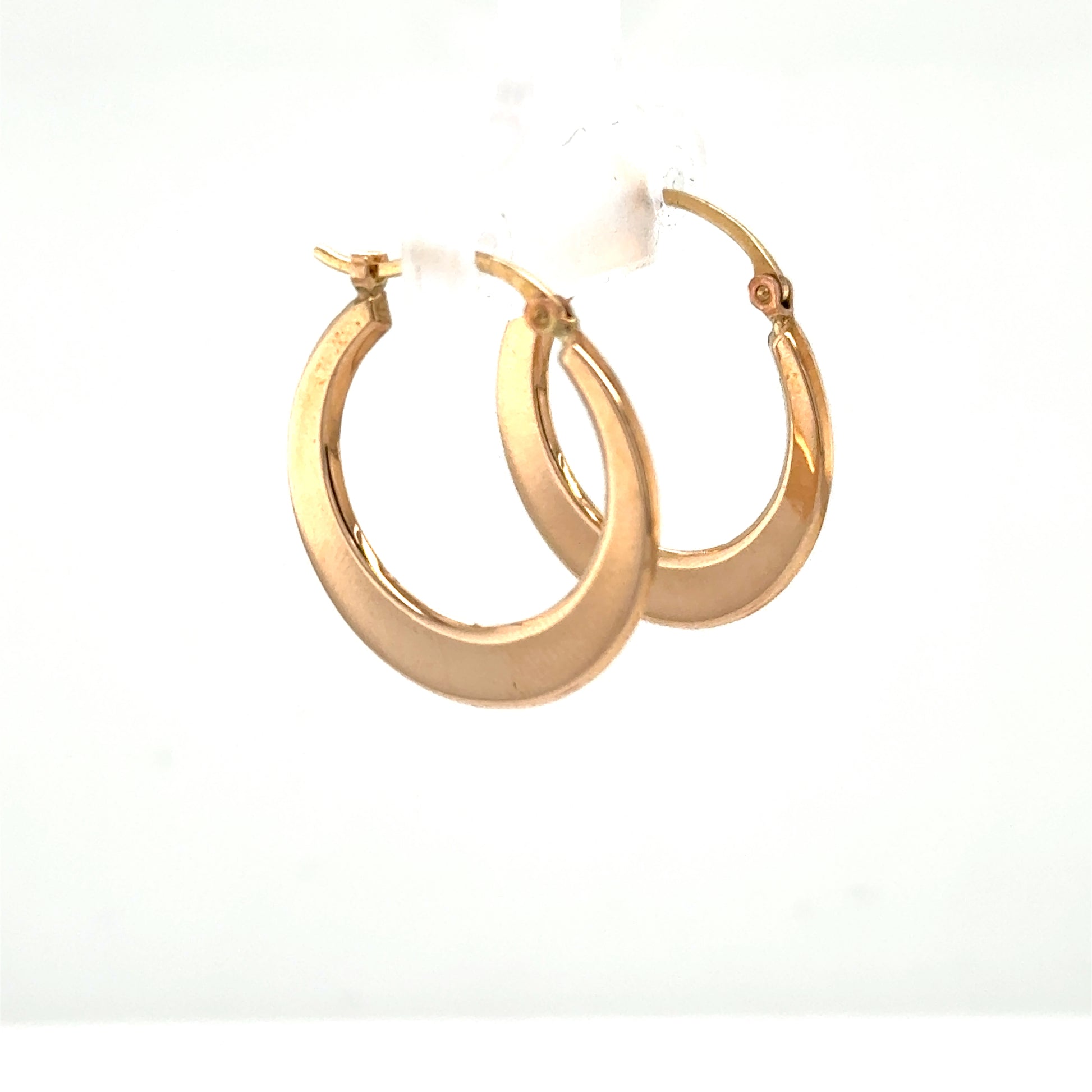 14K rose gold hoop earrings with tapered flat tubing and hinge closures.