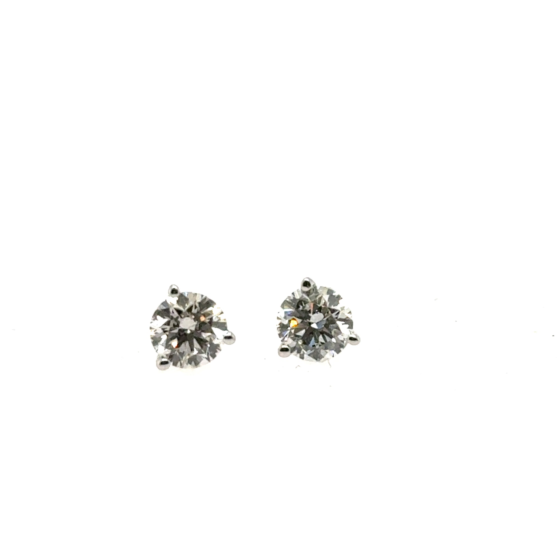 Round lab-grown diamond stud earrings in white gold three-prong martini settings.