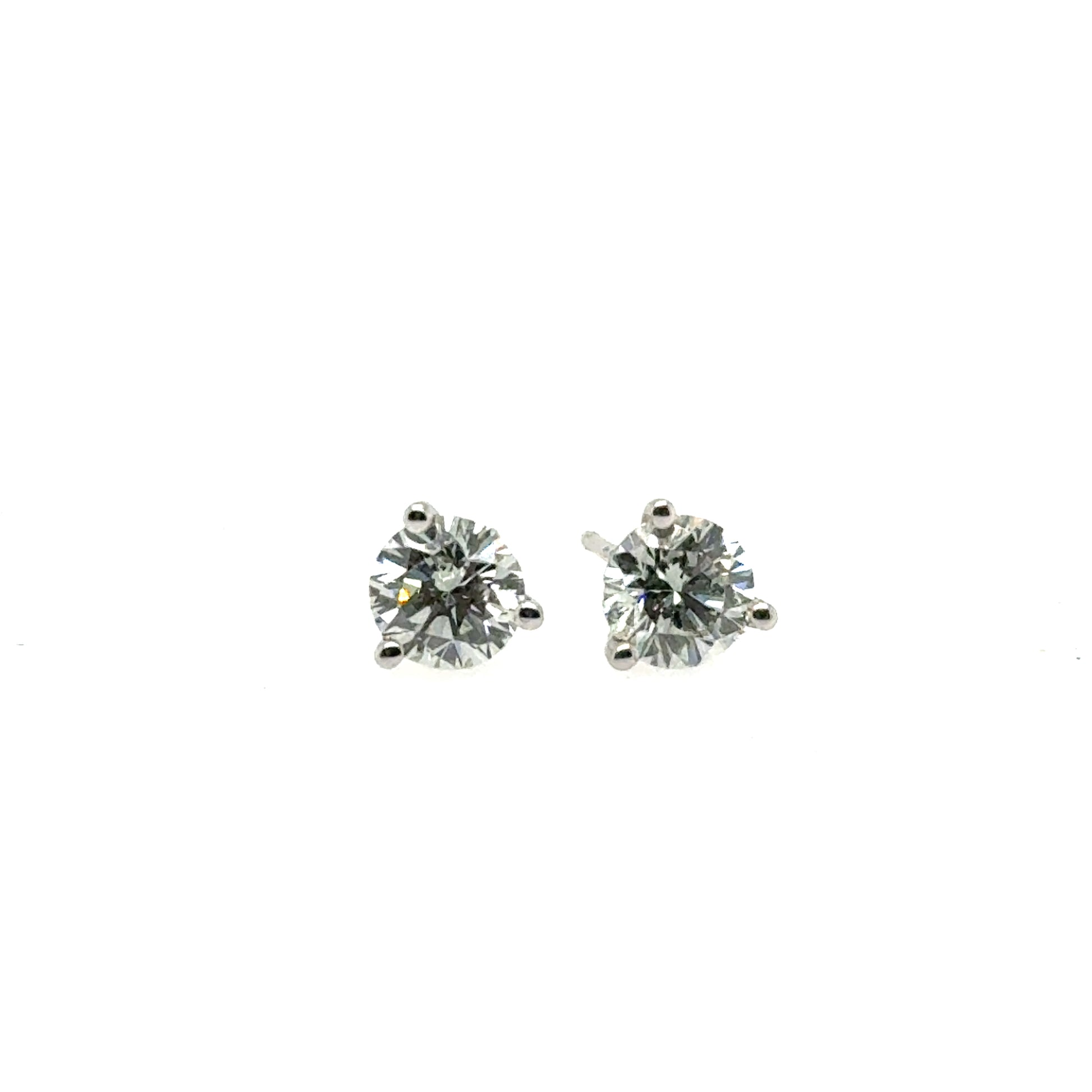 Round lab-grown diamond stud earrings in white gold three-prong martini settings.