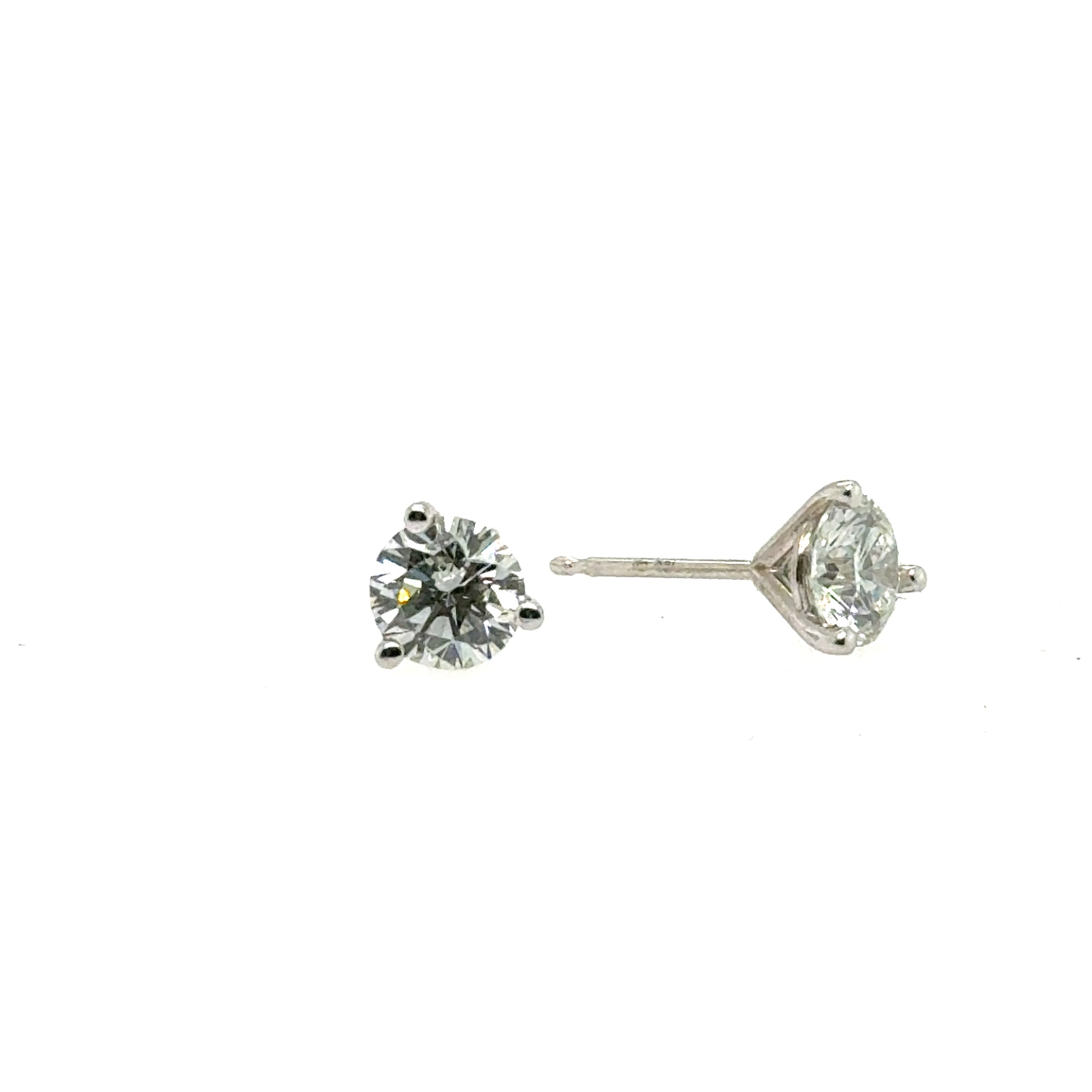 White gold stud earrings with round lab-grown diamonds in three-prong martini settings.