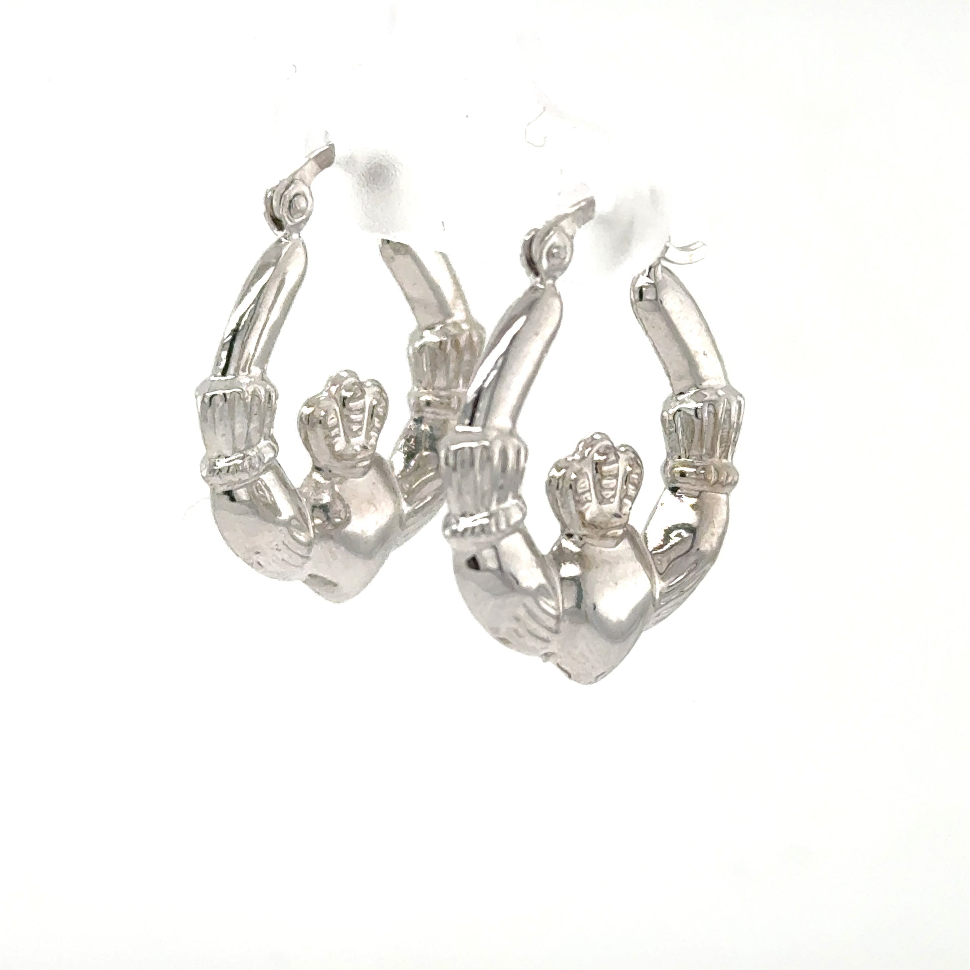 14K white gold Claddagh hoop earrings with crowned heart and hands motif.