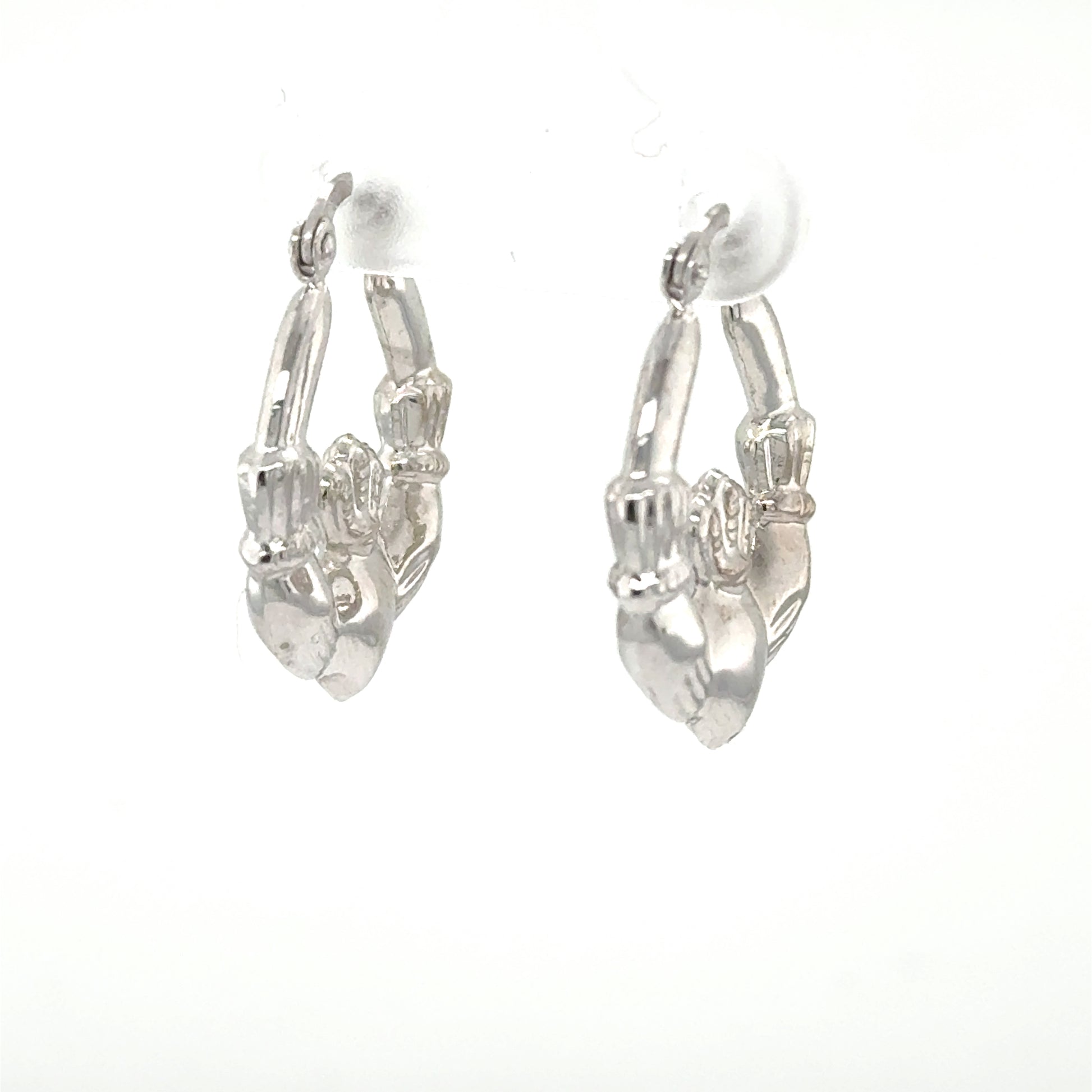 14K white gold hoop earrings with Claddagh heart, crown, and hands motif.