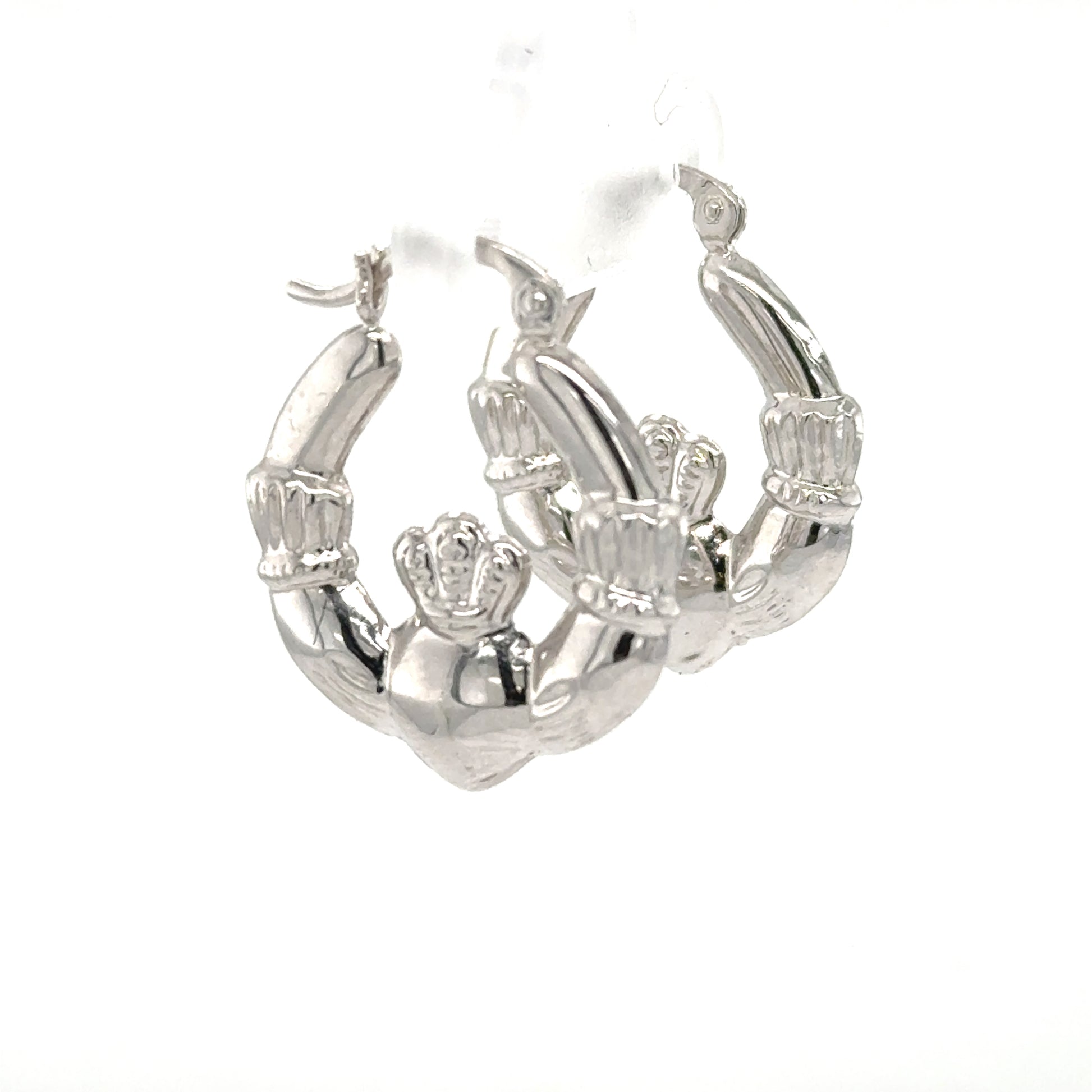 Polished 14K white gold Claddagh hoop earrings with hinged latch backs.