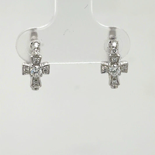 14K white gold huggie earrings with diamond cross charms, center stones highlighted.