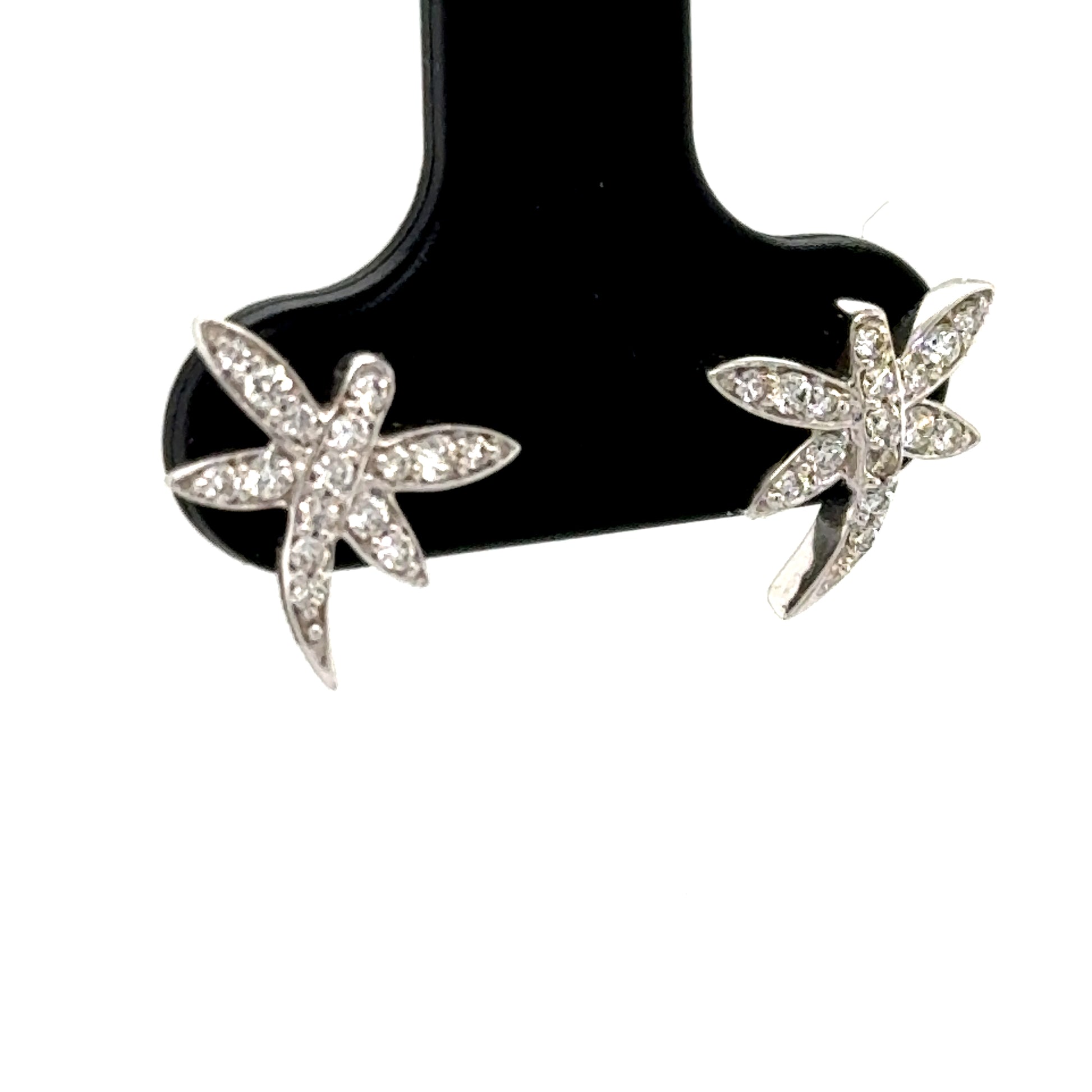 14K white gold diamond dragonfly stud earrings with pavé-set wings.