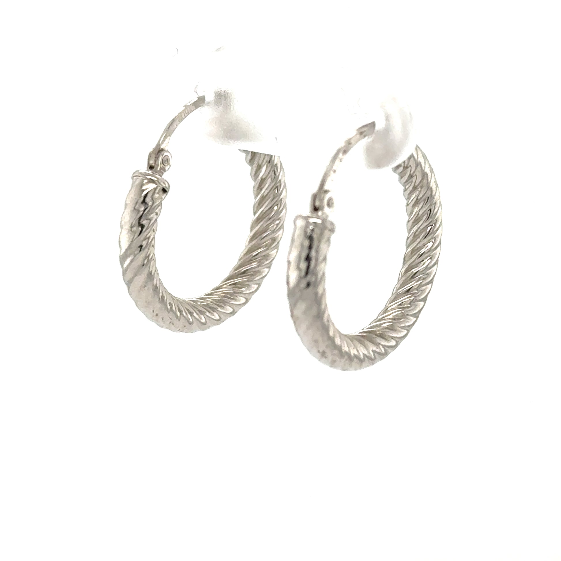 Small 14K white gold ribbed tube hoop earrings with hinged posts.