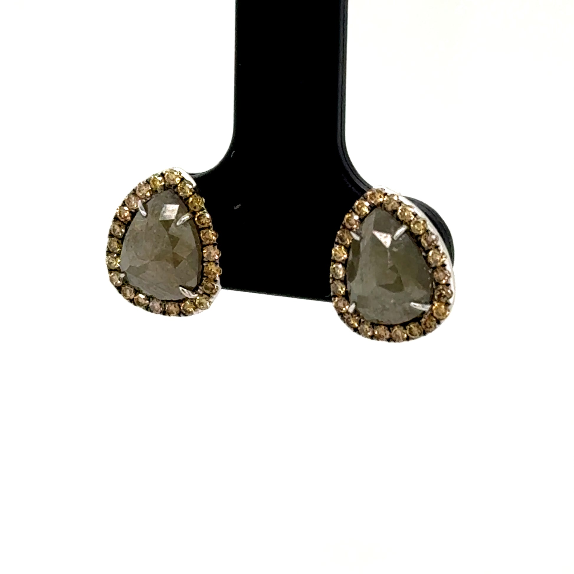 Pear-shaped slice diamond studs in 14K white gold with round diamond halos.