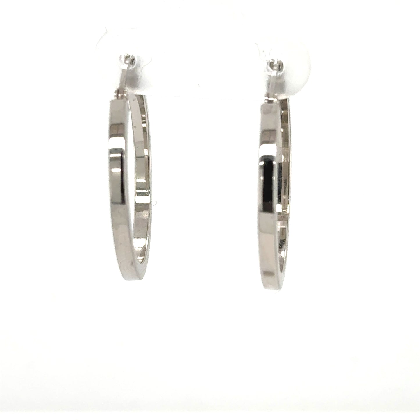 Pair of 14K white gold square-tube hoop earrings with post backs.