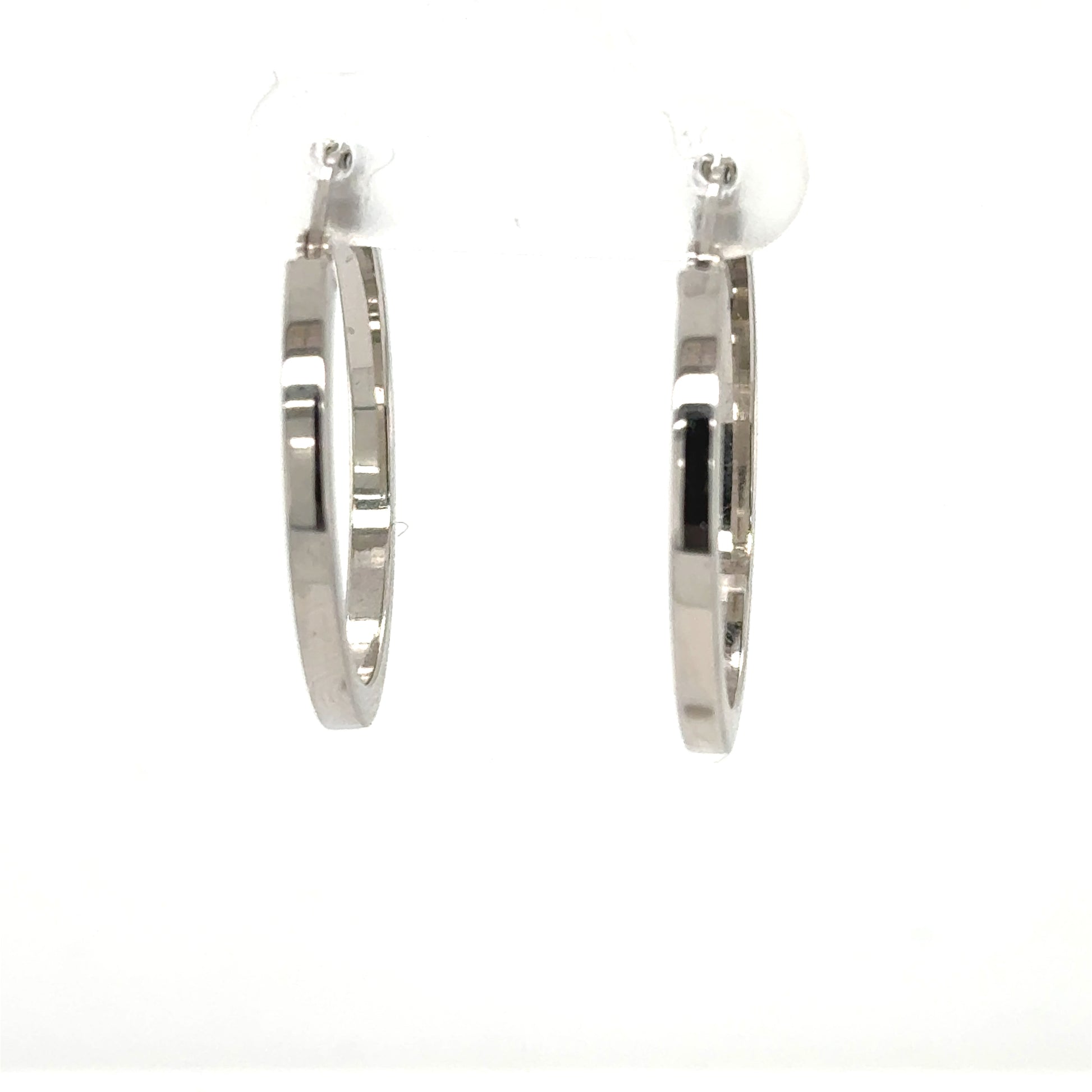 Pair of 14K white gold square-tube hoop earrings with post backs.