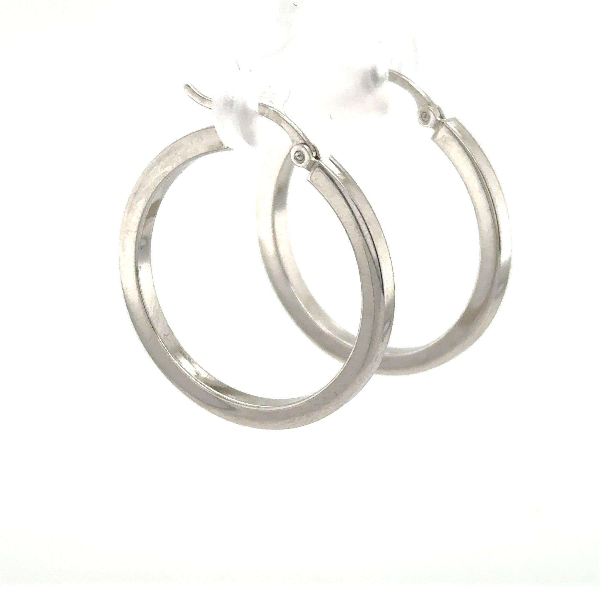14K white gold hoop earrings with square-tube profile and hinged snap closures.