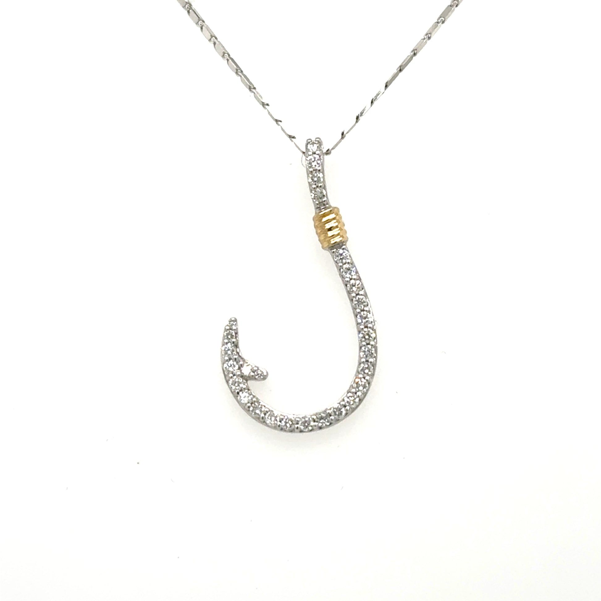 14K white gold diamond fish hook pendant with yellow gold wrapped accent.