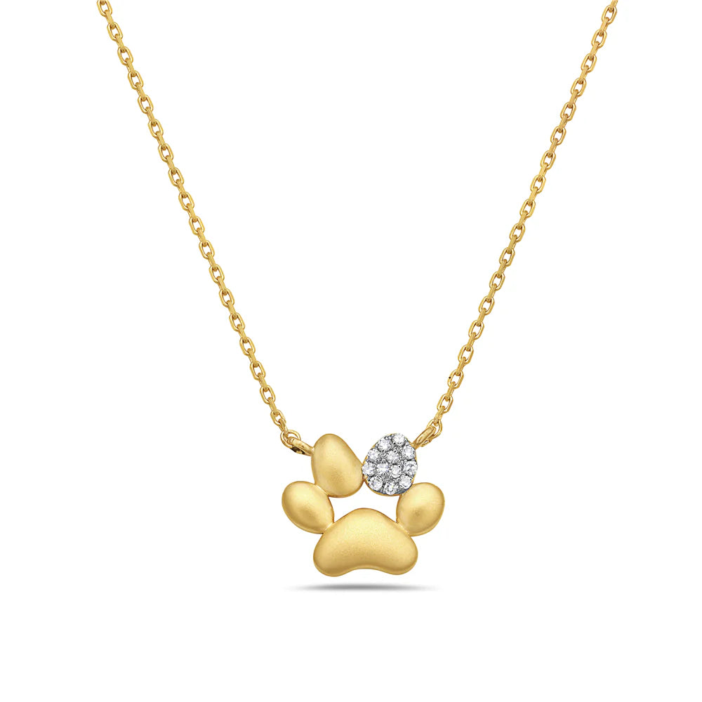 14K yellow gold paw print pendant with diamond toe on cable chain.