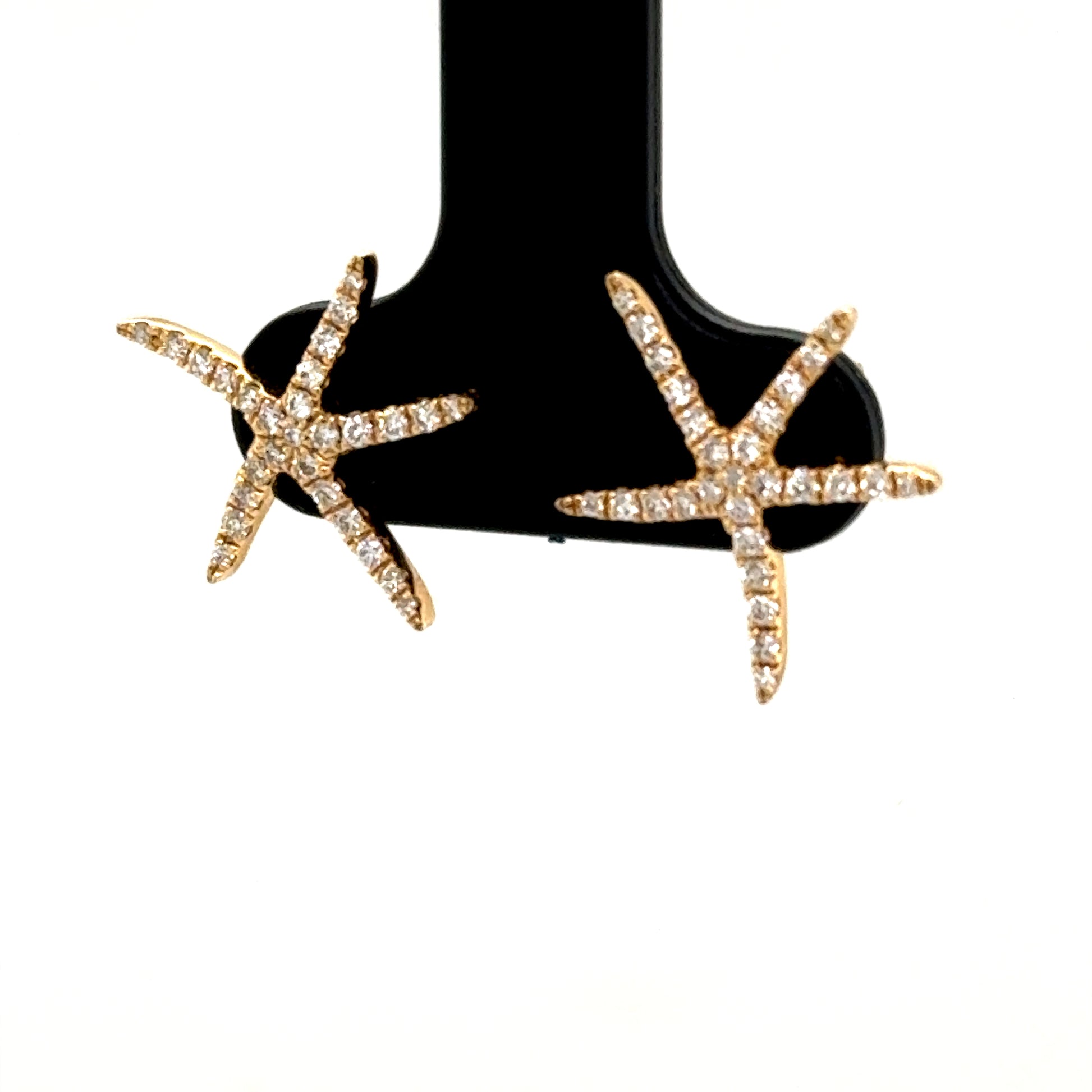 14K yellow gold starfish stud earrings pavé-set with round white diamonds.
