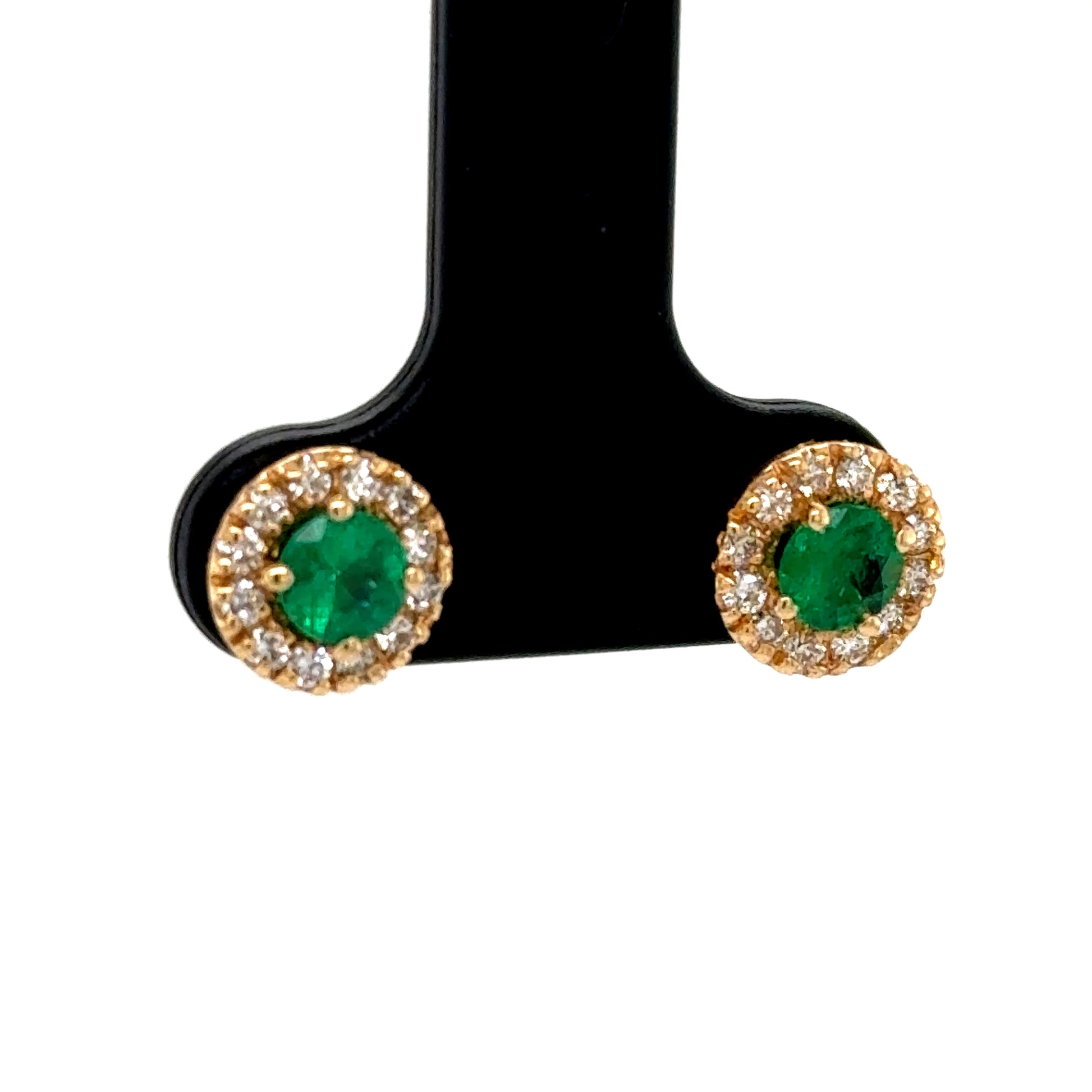 14K yellow gold stud earrings with round green emeralds and diamond halos.