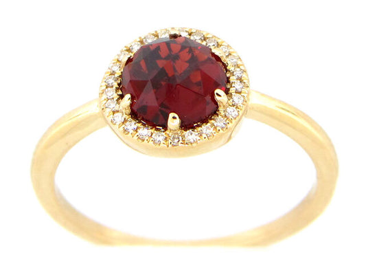 14K yellow gold ring with round garnet and diamond halo on slim band.