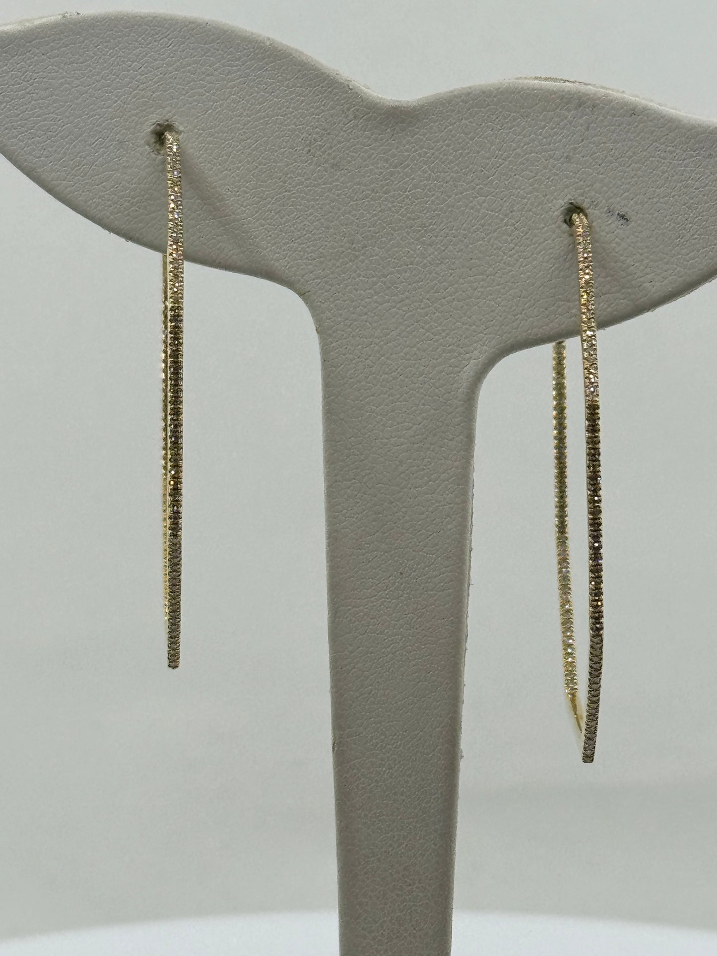 14K yellow gold large inside-out diamond hoop earrings with slender octagon shape.