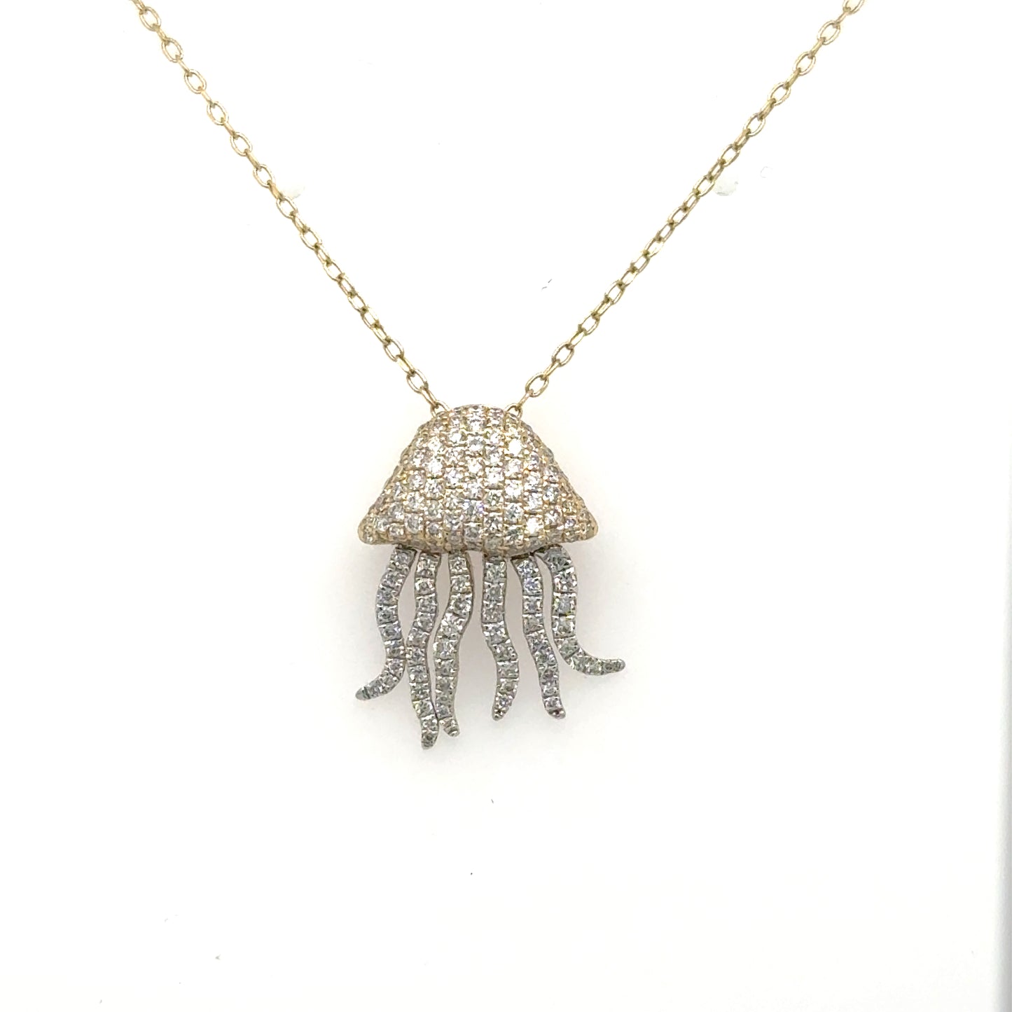 14K yellow and white gold jellyfish pendant with pavé diamond body and tentacles.