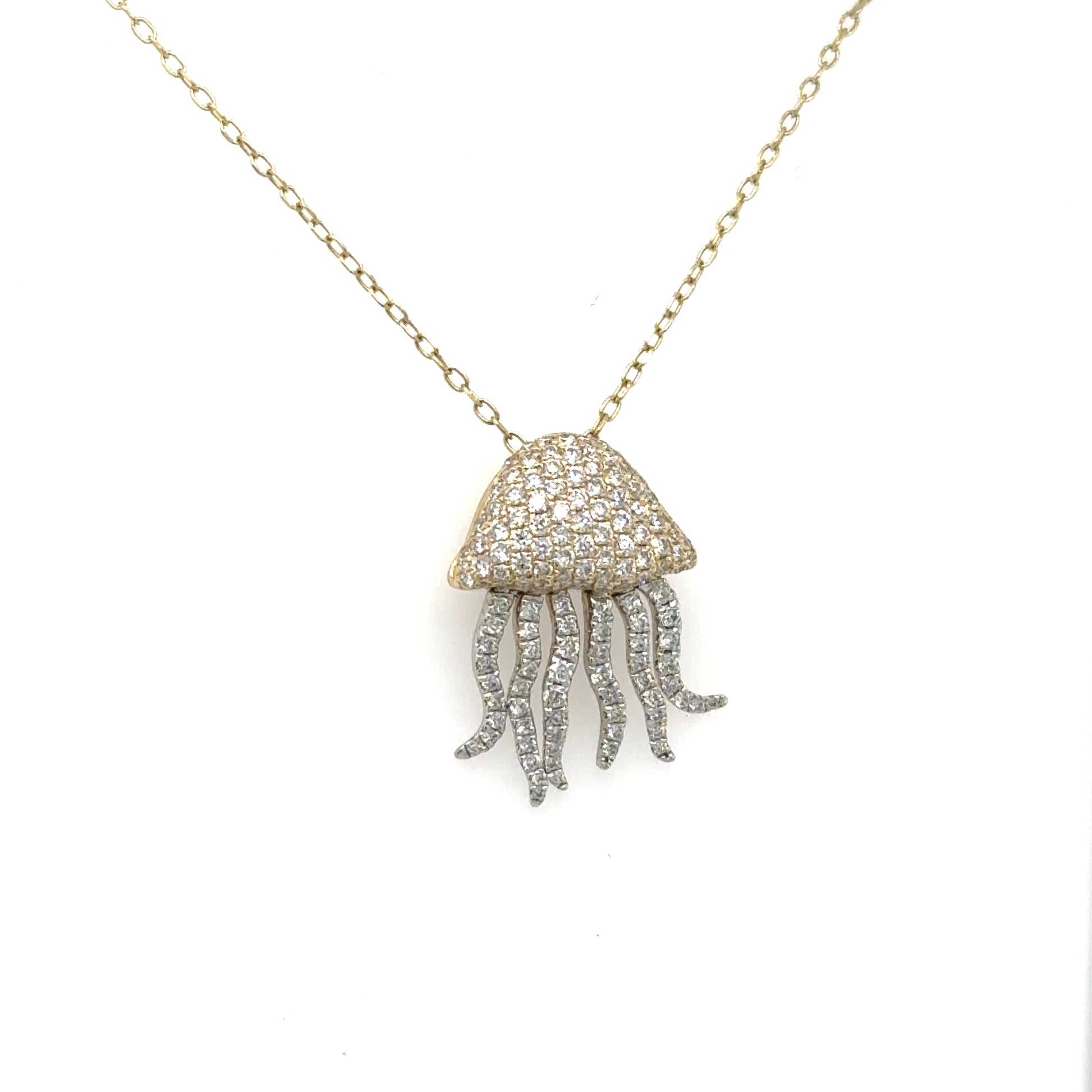 14K yellow and white gold diamond jellyfish pendant with pave dome and dangling tentacles.