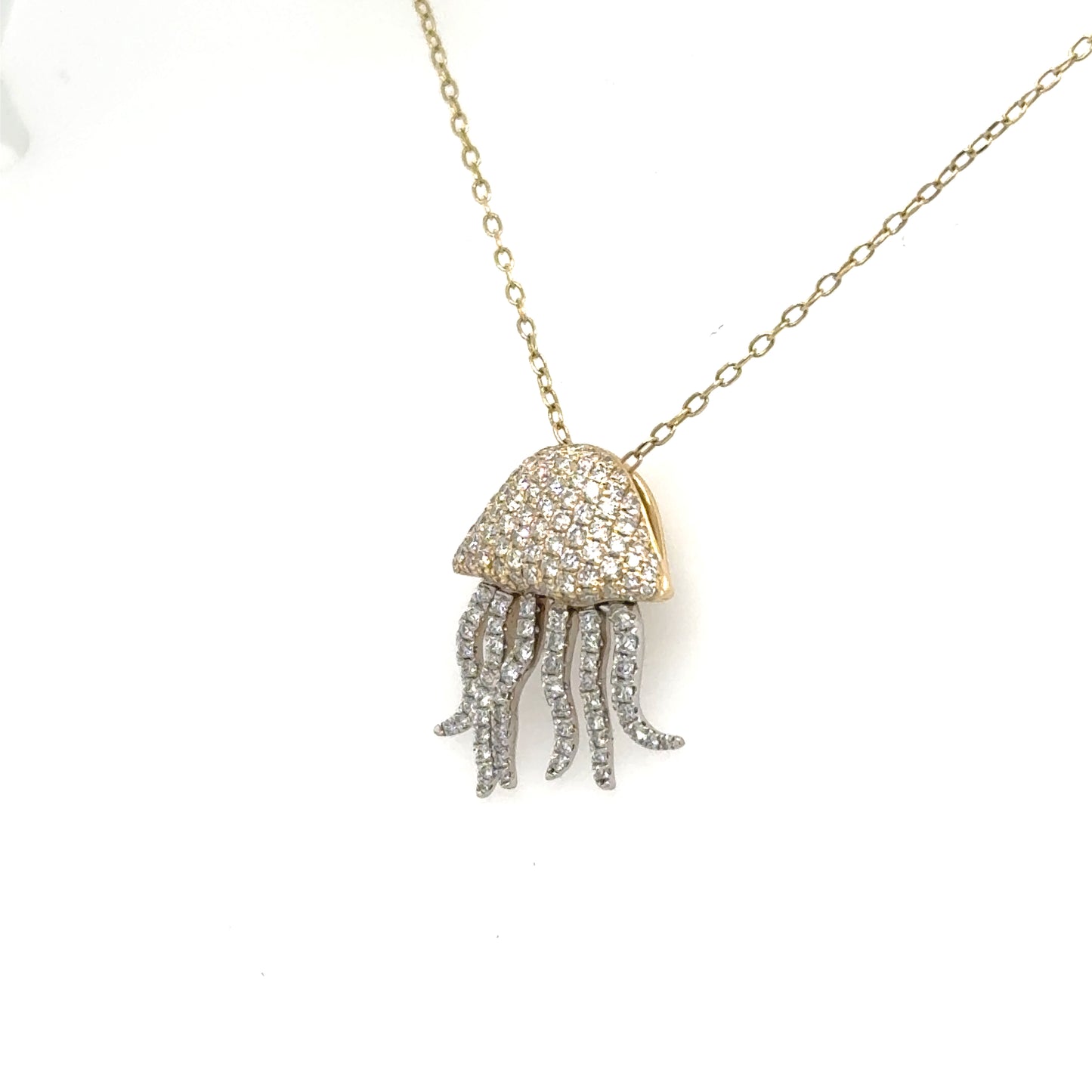 14K yellow and white gold jellyfish pendant with pavé diamond body and tentacles.