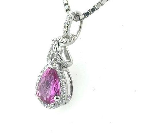 18K white gold pendant with pear-shaped pink sapphire and diamond halo bail.