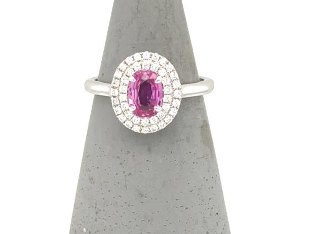 18K white gold ring with oval pink sapphire and double diamond halo.