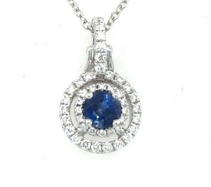 18K white gold pendant with round blue sapphire and double diamond halo.