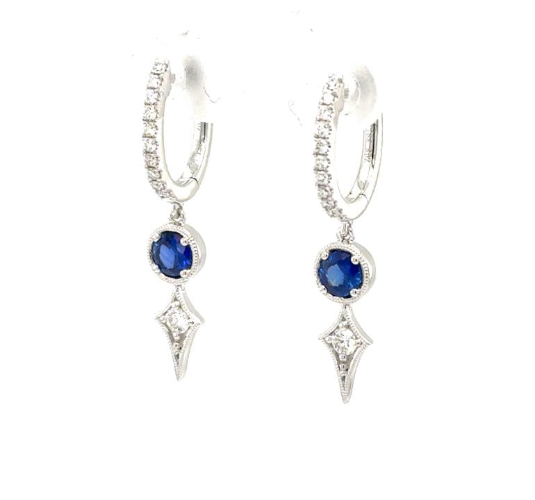 18K white gold diamond hoops with round blue sapphire and diamond dangles.