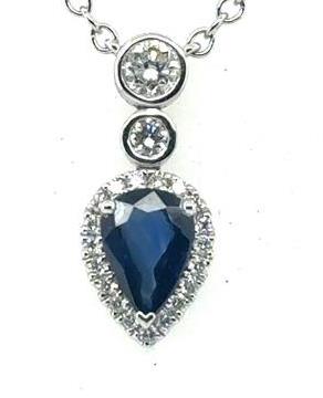18K white gold necklace with pear blue sapphire halo and bezel diamonds.