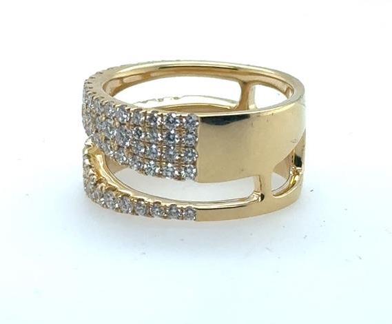 18K yellow gold wide freeform band with pavé-set round diamonds and openwork.