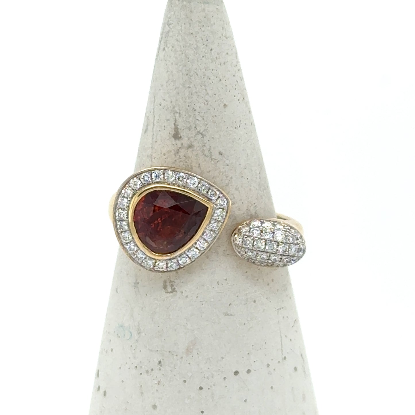 18K yellow gold Toi et Moi ring with pear garnet and diamond halos.